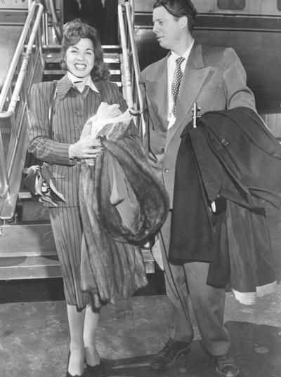 Samia Gamal and Sheppard King departing airplane