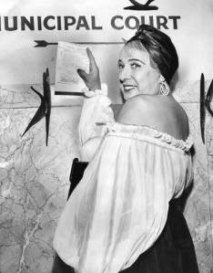 Photograph of Ray entering court with his medical certificate.