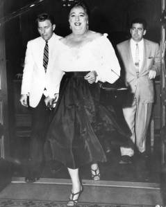 Photograph of Ray in drag leaving court.